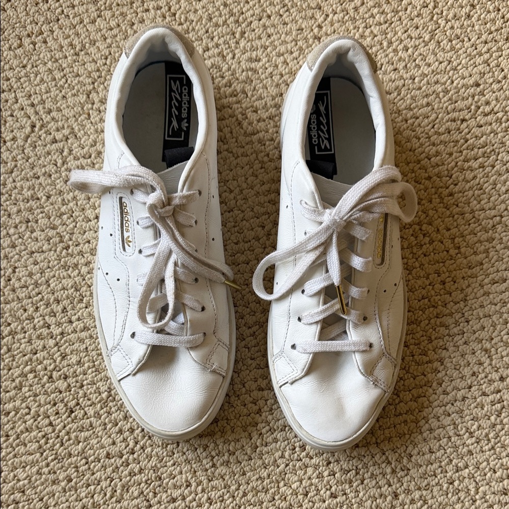 adidas White Low-Top Leather Sneakers with Gold Accents
